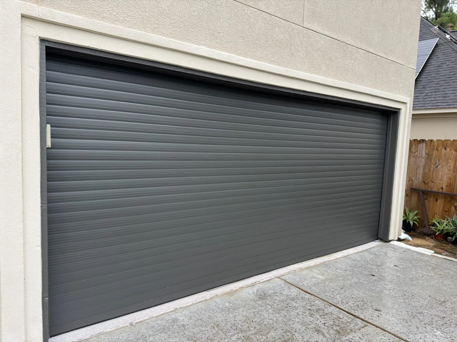 Custom TMAX roll-up garage door installation