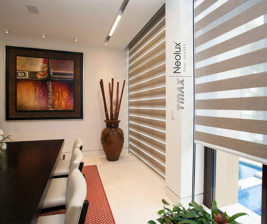 Neolux dual shades installed in a modern dining room